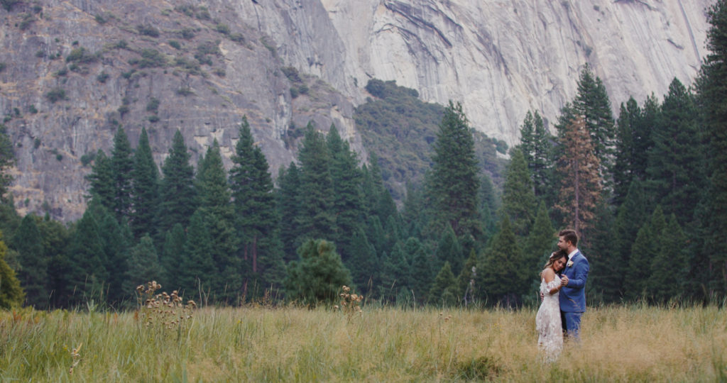 Bride and groom dancing in Yosemite Valley Meadow
